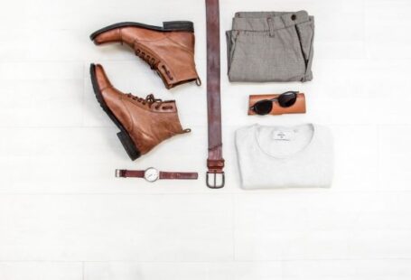Fashion - pair of brown leather boots beside bet
