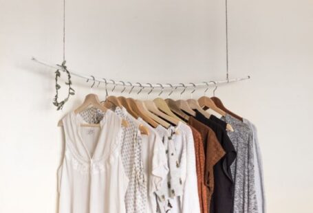 Fashion - assorted clothes in wooden hangers