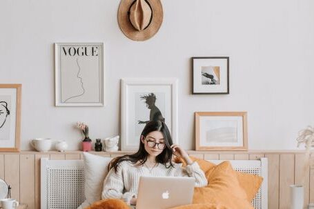 Comfortable Fashion - Woman Using Laptop In Bed