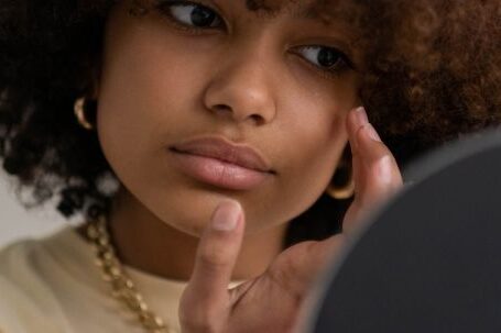 Fashion's Influence - Woman Looking At A Mirror